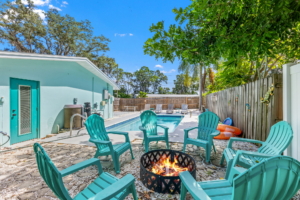 Heated pool and fire pit outdoor living at 201 South Street in Ozona
